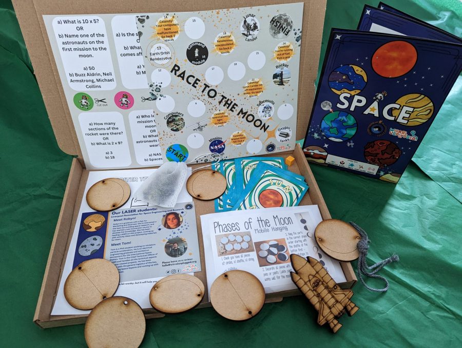 A space-themed activity box brimming with captivating resources. Inside the box, you'll find a snap game featuring stunning images of galaxies, planets, and astronauts. Additionally, there are various board games designed to ignite curiosity about space exploration, allowing children to learn about celestial bodies and space missions through engaging play. The box also includes a mobile enabling children to visualize. With its interactive and educational contents, this space box offers an immersive experience, fostering a sense of wonder and discovery about the vast wonders of the universe.