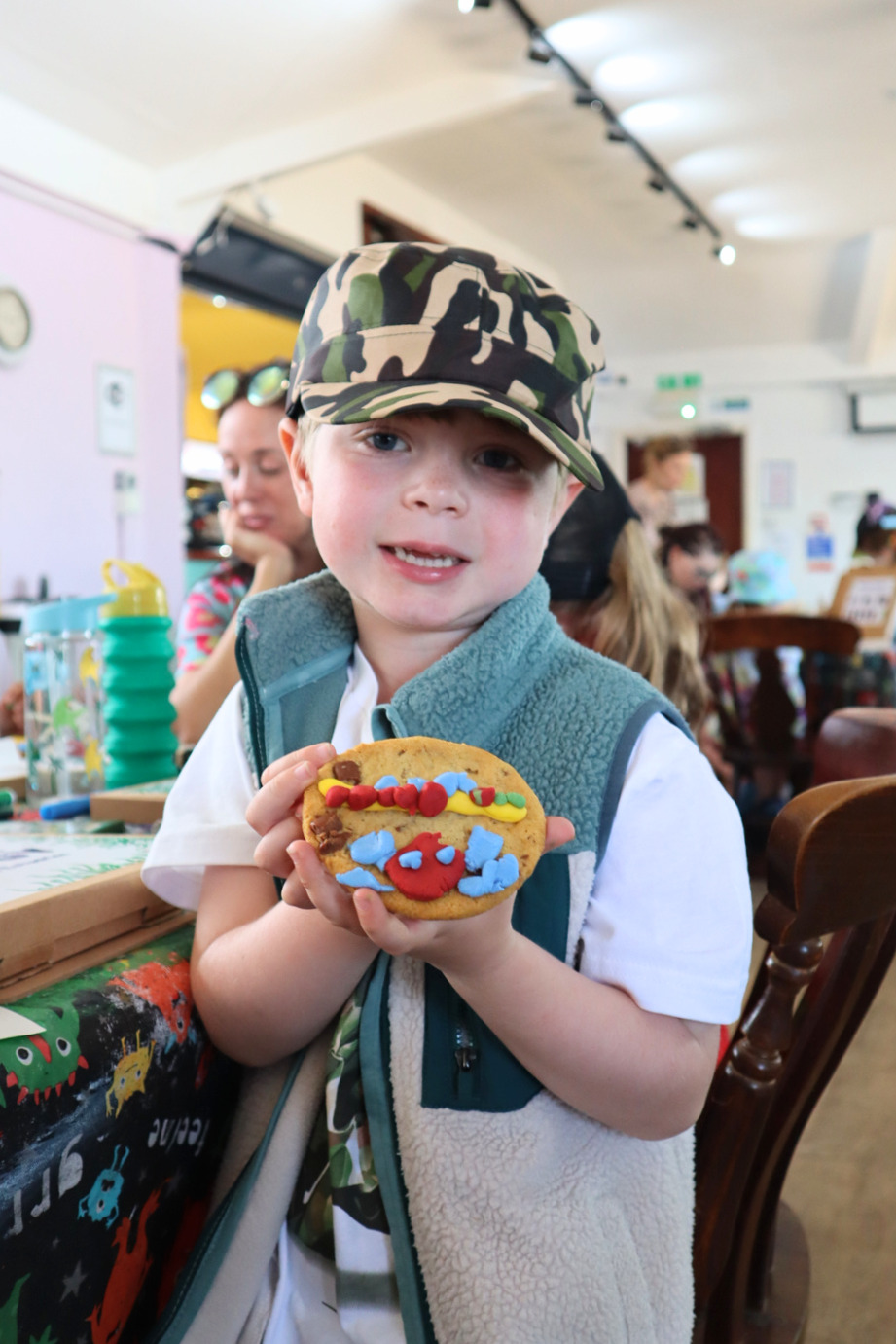 A Child holding a cookie