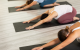 Group practicing yoga in studio